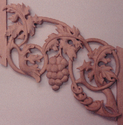 Carved grapes and leaves in pipe shades for the Schlicker pipe organ at Wisconsin Lutheran College, Wisconsin WI, Schlicker Organ Co. 